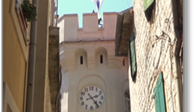 A clock on a building

Description automatically generated with medium confidence
